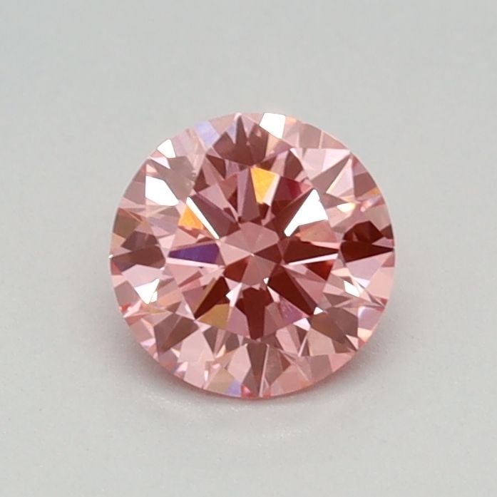 Loose Diamond - ROUND 0.45ct Fancy Vivid Pink VS1: Loose Diamond - ROUND 0.45ct Fancy Vivid Pink VS1 Source: This is a real non-mined Diamond that has been grown in a lab Shape: ROUND Carats: 0.45 Color: Fancy Vivid Pink Certification: IGI Video: