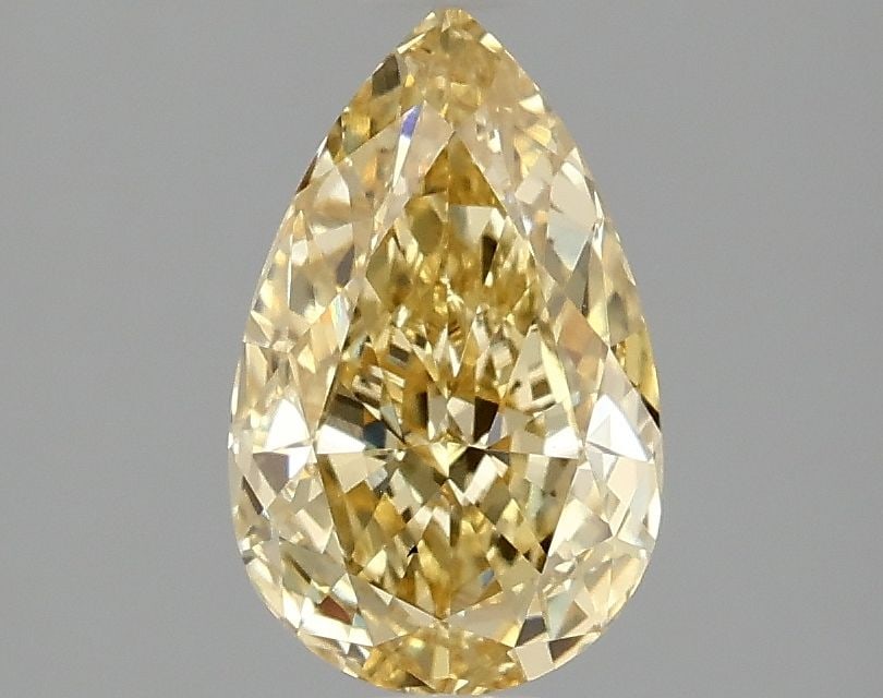 Loose Diamond - PEAR 1.52ct Fancy Vivid Yellow VS1: Loose Diamond - PEAR 1.52ct Fancy Vivid Yellow VS1 Source: This is a real non-mined Diamond that has been grown in a lab Shape: PEAR Carats: 1.52 Color: Fancy Vivid Yellow Certification: IGI Video: