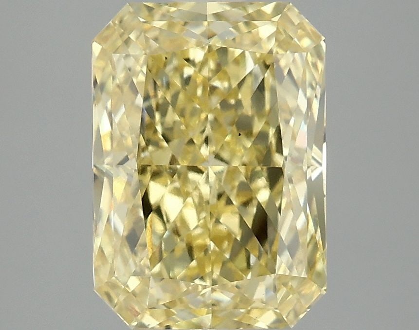 Loose Diamond - RADIANT 3.08ct Fancy Vivid Yellow VS1: Loose Diamond - RADIANT 3.08ct Fancy Vivid Yellow VS1 Source: This is a real non-mined Diamond that has been grown in a lab Shape: RADIANT Carats: 3.08 Color: Fancy Vivid Yellow Certification: IGI Vid