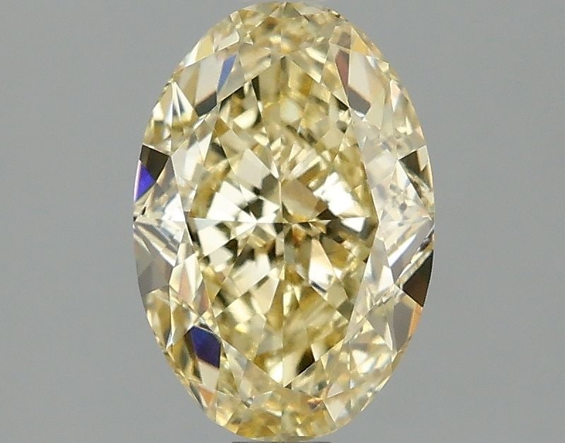 Loose Diamond - OVAL 2.02ct Fancy Intense Yellow VVS2: Loose Diamond - OVAL 2.02ct Fancy Intense Yellow VVS2 Source: This is a real non-mined Diamond that has been grown in a lab Shape: OVAL Carats: 2.02 Color: Fancy Intense Yellow Certification: IGI Vide