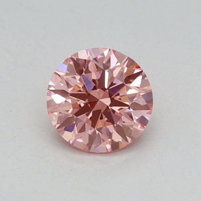Loose Diamond - ROUND 0.32ct Fancy Vivid Pink VVS2: Loose Diamond - ROUND 0.32ct Fancy Vivid Pink VVS2 Source: This is a real non-mined Diamond that has been grown in a lab Shape: ROUND Carats: 0.32 Color: Fancy Vivid Pink Certification: IGI Video: