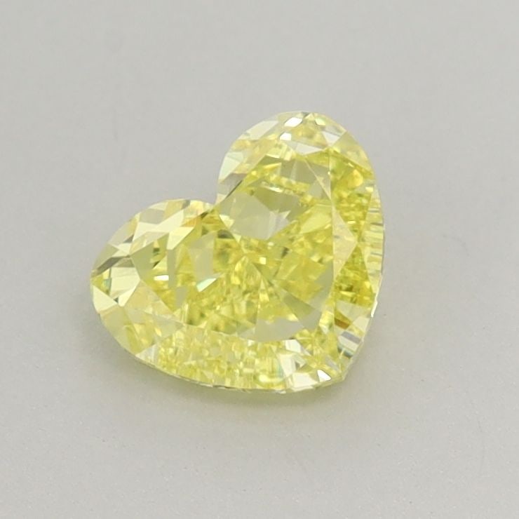 Loose Diamond - HEART 0.75ct Fancy Vivid Yellow VS1: Loose Diamond - HEART 0.75ct Fancy Vivid Yellow VS1 Source: This is a real non-mined Diamond that has been grown in a lab Shape: HEART Carats: 0.75 Color: Fancy Vivid Yellow Certification: IGI Video: