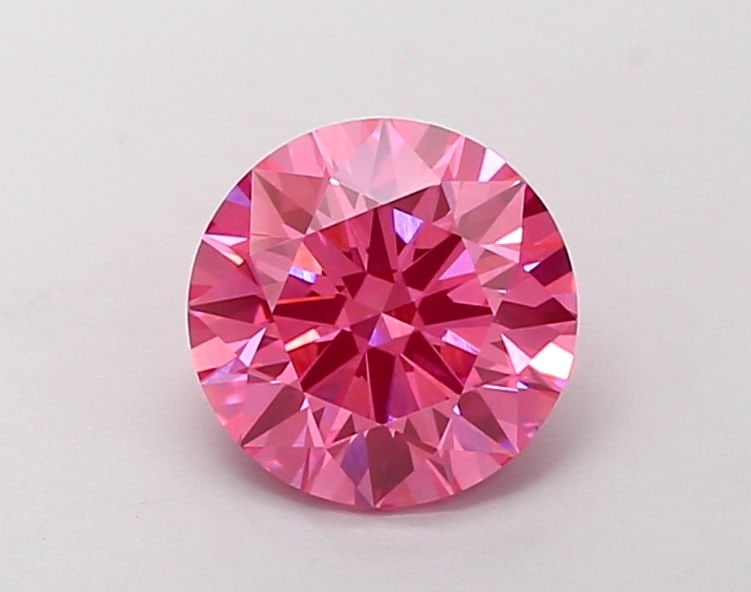 Ideal Loose Diamond - ROUND 1.24ct Fancy Vivid Pink VS1: Ideal Loose Diamond - ROUND 1.24ct Fancy Vivid Pink VS1 Source: This is a real non-mined Diamond that has been grown in a lab Shape: ROUND Carats: 1.24 Color: Fancy Vivid Pink Certification: IGI