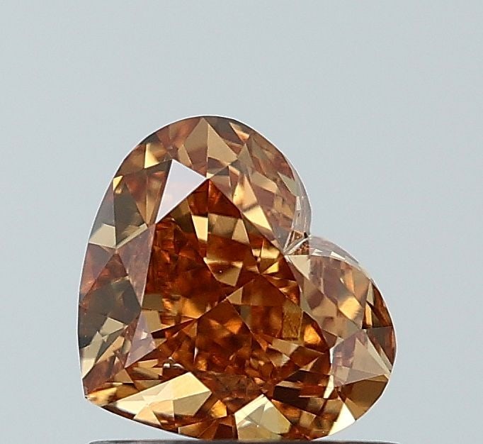 Loose Diamond - HEART 1.01ct Fancy Vivid Brown VS1: Loose Diamond - HEART 1.01ct Fancy Vivid Brown VS1 Source: This is a real non-mined Diamond that has been grown in a lab Shape: HEART Carats: 1.01 Color: Fancy Vivid Brown Certification: NONE Video: