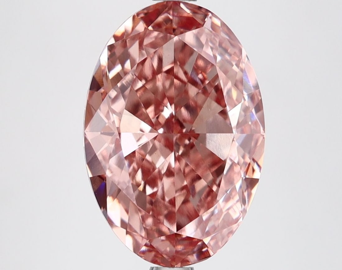 Loose Diamond - OVAL 4.14ct Fancy Vivid Brownish Pink VVS2: Loose Diamond - OVAL 4.14ct Fancy Vivid Brownish Pink VVS2 Source: This is a real non-mined Diamond that has been grown in a lab Shape: OVAL Carats: 4.14 Color: Fancy Vivid Brownish Pink
