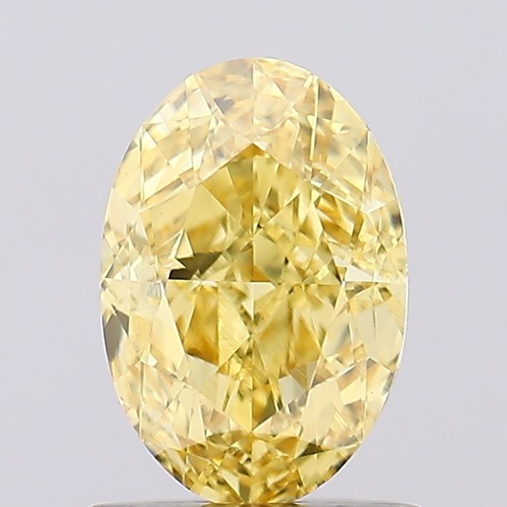 Loose Diamond - OVAL 1.04ct Fancy Vivid Yellow VS1: Loose Diamond - OVAL 1.04ct Fancy Vivid Yellow VS1 Source: This is a real non-mined Diamond that has been grown in a lab Shape: OVAL Carats: 1.04 Color: Fancy Vivid Yellow Certification: IGI Video: