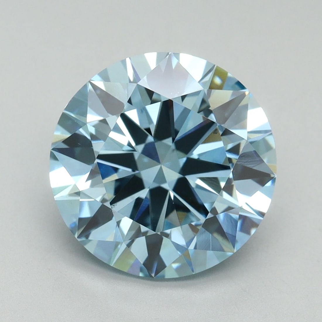 Loose Diamond - ROUND 5.02ct Fancy Vivid Blue VS1: Loose Diamond - ROUND 5.02ct Fancy Vivid Blue VS1 Source: This is a real non-mined Diamond that has been grown in a lab Shape: ROUND Carats: 5.02 Color: Fancy Vivid Blue Certification: IGI Video: