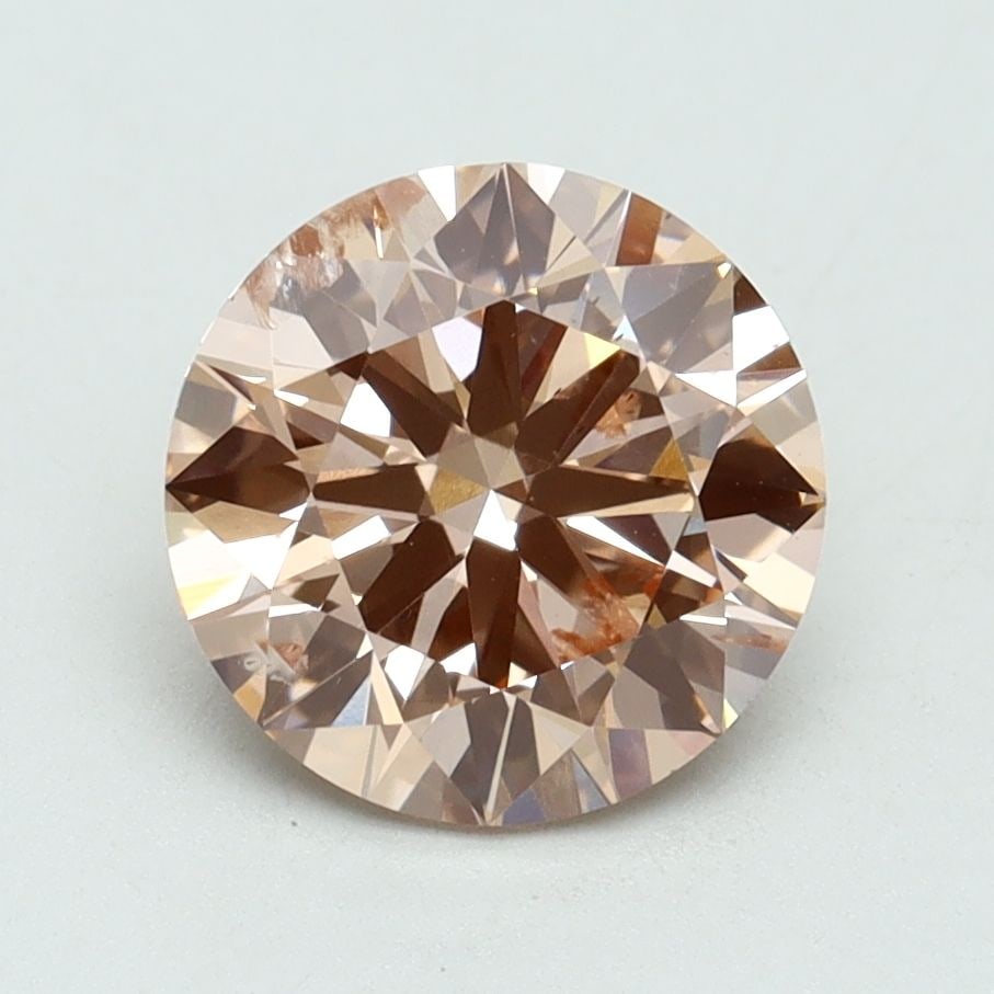Loose Diamond - ROUND 2.01ct Fancy Pink SI2: Loose Diamond - ROUND 2.01ct Fancy Pink SI2 Source: This is a real non-mined Diamond that has been grown in a lab Shape: ROUND Carats: 2.01 Color: Fancy Pink Certification: IGI Video: