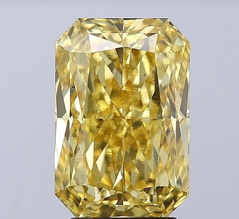 Loose Diamond - RADIANT 4.19ct Fancy Vivid Yellow VS2: Loose Diamond - RADIANT 4.19ct Fancy Vivid Yellow VS2 Source: This is a real non-mined Diamond that has been grown in a lab Shape: RADIANT Carats: 4.19 Color: Fancy Vivid Yellow Certification: IGI Vid