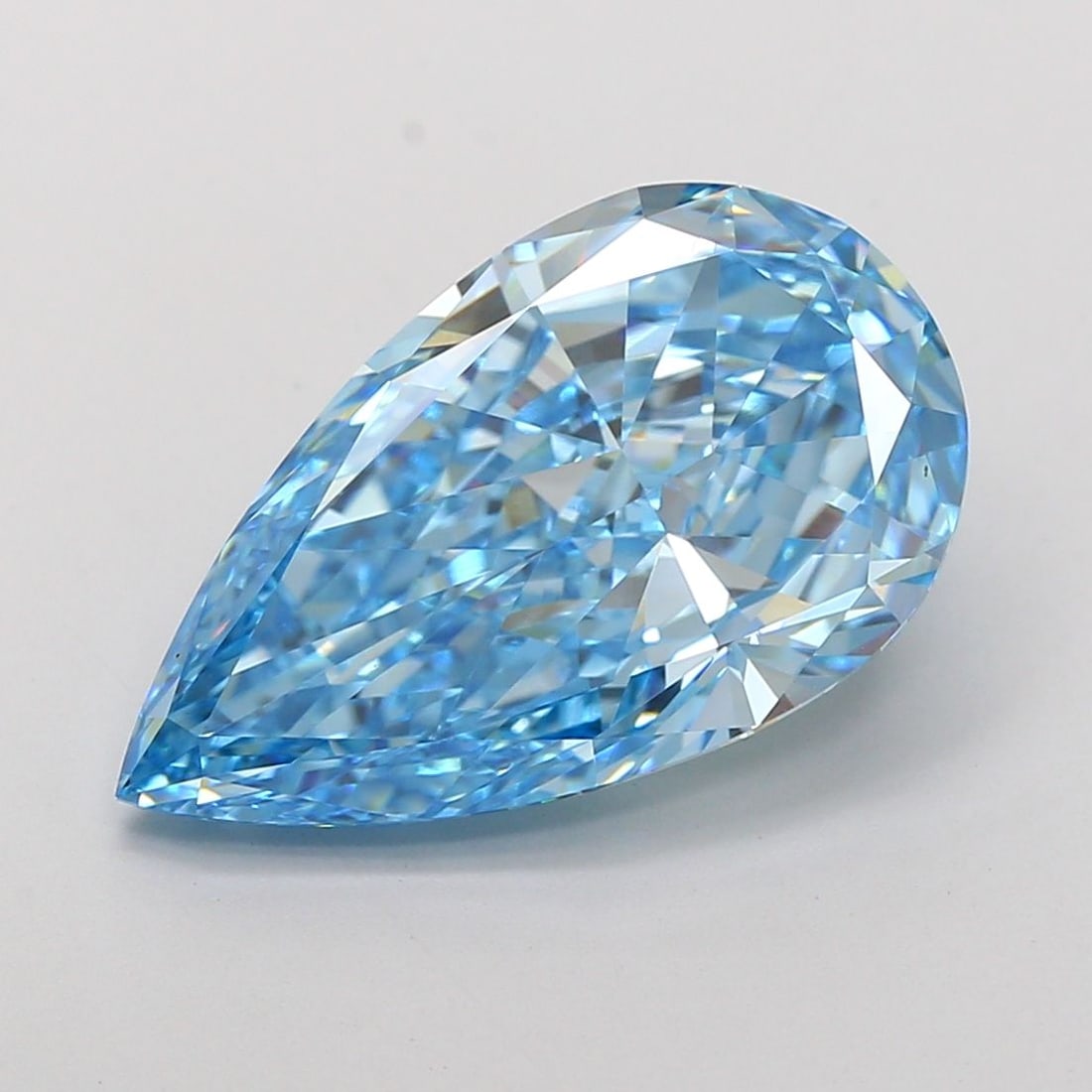 Loose Diamond - PEAR 7.44ct Fancy Vivid Blue VVS2: Loose Diamond - PEAR 7.44ct Fancy Vivid Blue VVS2 Source: This is a real non-mined Diamond that has been grown in a lab Shape: PEAR Carats: 7.44 Color: Fancy Vivid Blue Certification: IGI Video: