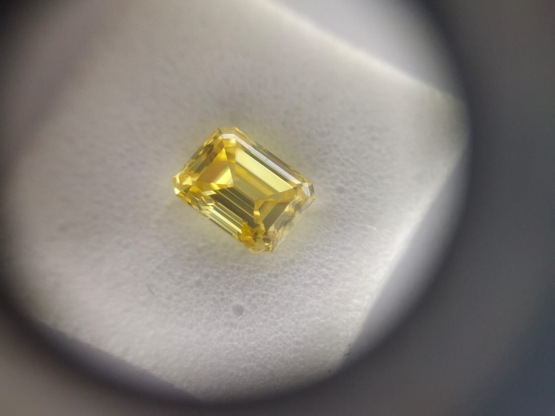 Loose Diamond - EMERALD 0.51ct Fancy Vivid Yellow VS2: Loose Diamond - EMERALD 0.51ct Fancy Vivid Yellow VS2 Source: This is a real non-mined Diamond that has been grown in a lab Shape: EMERALD Carats: 0.51 Color: Fancy Vivid Yellow Certification: IGI The