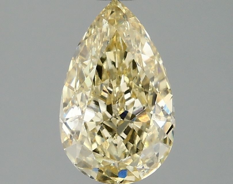 Loose Diamond - PEAR 1.59ct Fancy Yellow VS2: Loose Diamond - PEAR 1.59ct Fancy Yellow VS2 Source: This is a real non-mined Diamond that has been grown in a lab Shape: PEAR Carats: 1.59 Color: Fancy Yellow Certification: IGI Video: