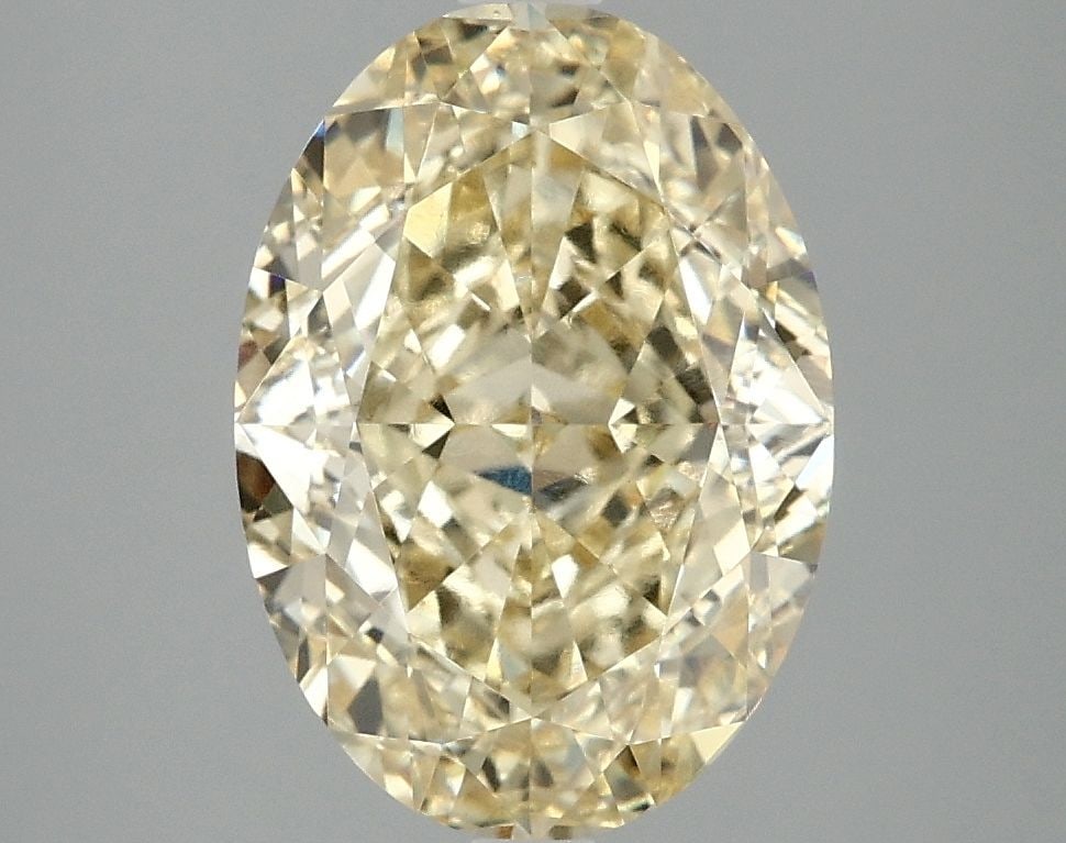 Loose Diamond - OVAL 4.1ct Fancy Vivid Yellow VS1: Loose Diamond - OVAL 4.1ct Fancy Vivid Yellow VS1 Source: This is a real non-mined Diamond that has been grown in a lab Shape: OVAL Carats: 4.1 Color: Fancy Vivid Yellow Certification: IGI Video: