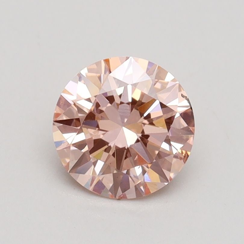 Loose Diamond - ROUND 0.9ct Fancy Intense Pink SI1: Loose Diamond - ROUND 0.9ct Fancy Intense Pink SI1 Source: This is a real non-mined Diamond that has been grown in a lab Shape: ROUND Carats: 0.9 Color: Fancy Intense Pink Certification: IGI Video: