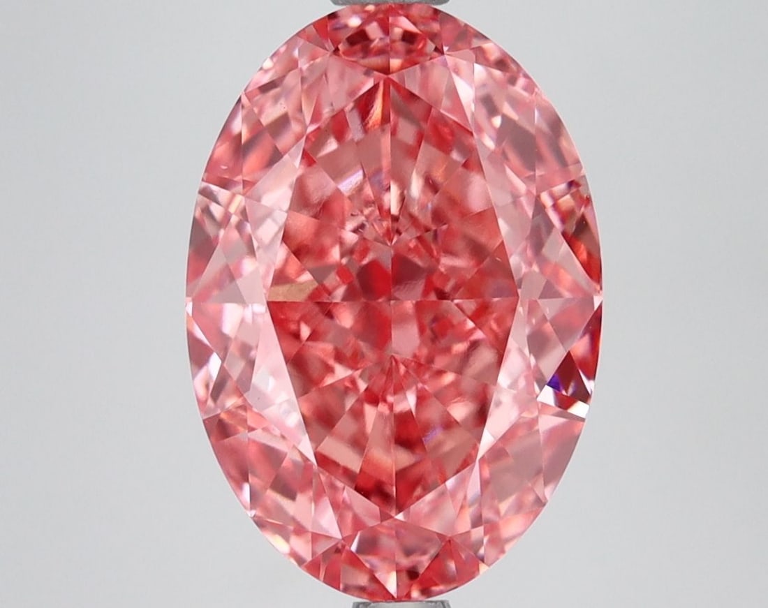 Loose Diamond - OVAL 4.54ct Fancy Vivid Pink VS2: Loose Diamond - OVAL 4.54ct Fancy Vivid Pink VS2 Source: This is a real non-mined Diamond that has been grown in a lab Shape: OVAL Carats: 4.54 Color: Fancy Vivid Pink Certification: IGI Video: