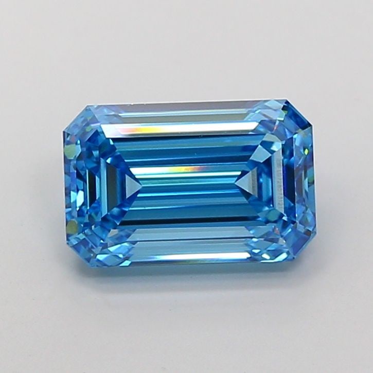 Loose Diamond - EMERALD 5.01ct Fancy Vivid Blue VS1: Loose Diamond - EMERALD 5.01ct Fancy Vivid Blue VS1 Source: This is a real non-mined Diamond that has been grown in a lab Shape: EMERALD Carats: 5.01 Color: Fancy Vivid Blue Certification: IGI Video: