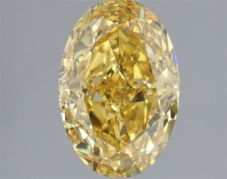 Loose Diamond - OVAL 2.14ct Fancy Vivid Yellow VS2: Loose Diamond - OVAL 2.14ct Fancy Vivid Yellow VS2 Source: This is a real non-mined Diamond that has been grown in a lab Shape: OVAL Carats: 2.14 Color: Fancy Vivid Yellow Certification: IGI Video: