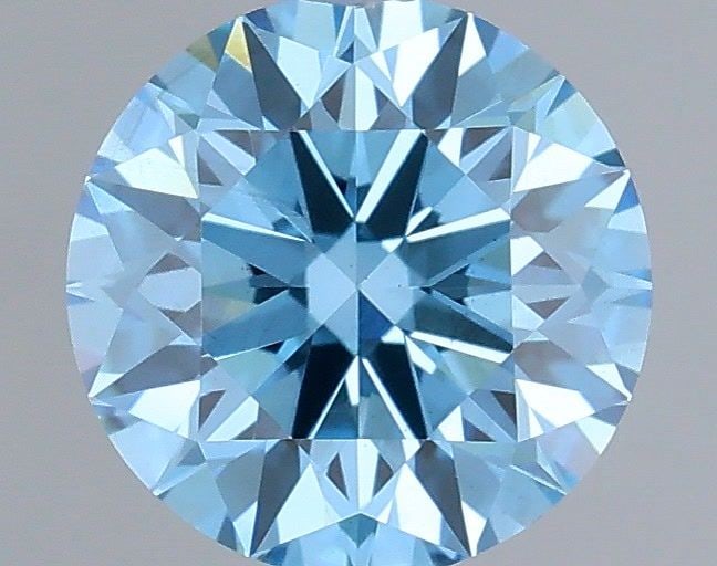 Ideal Loose Diamond - ROUND 0.64ct Fancy Vivid Blue VS1: Ideal Loose Diamond - ROUND 0.64ct Fancy Vivid Blue VS1 Source: This is a real non-mined Diamond that has been grown in a lab Shape: ROUND Carats: 0.64 Color: Fancy Vivid Blue Certification: IGI Video
