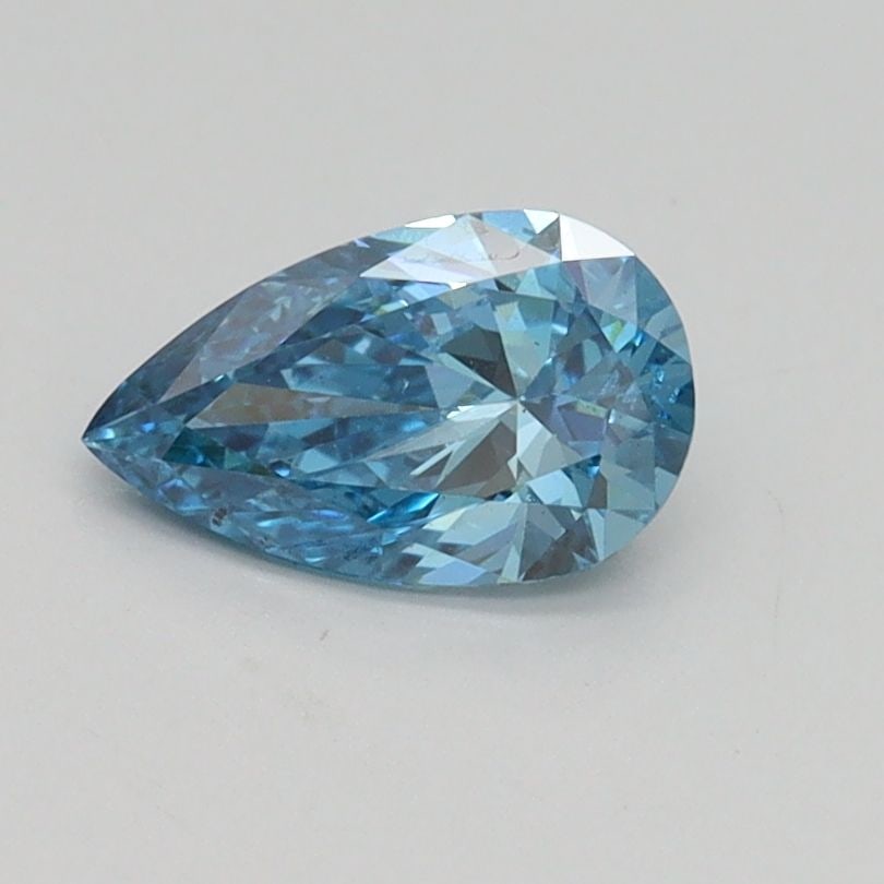 Loose Diamond - PEAR 0.6ct Fancy Vivid Blue SI1: Loose Diamond - PEAR 0.6ct Fancy Vivid Blue SI1 Source: This is a real non-mined Diamond that has been grown in a lab Shape: PEAR Carats: 0.6 Color: Fancy Vivid Blue Certification: IGI Video: