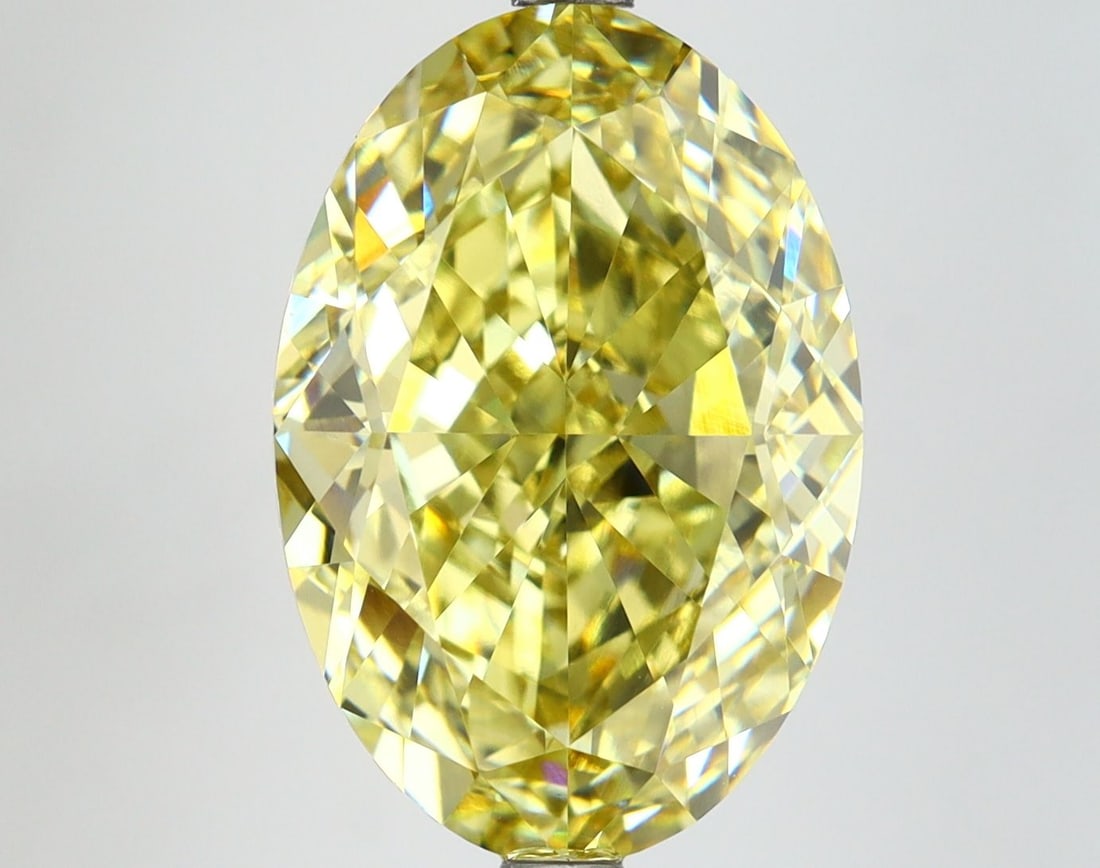 Loose Diamond - OVAL 8.18ct Fancy Intense Yellow VVS2: Loose Diamond - OVAL 8.18ct Fancy Intense Yellow VVS2 Source: This is a real non-mined Diamond that has been grown in a lab Shape: OVAL Carats: 8.18 Color: Fancy Intense Yellow Certification: IGI Vide