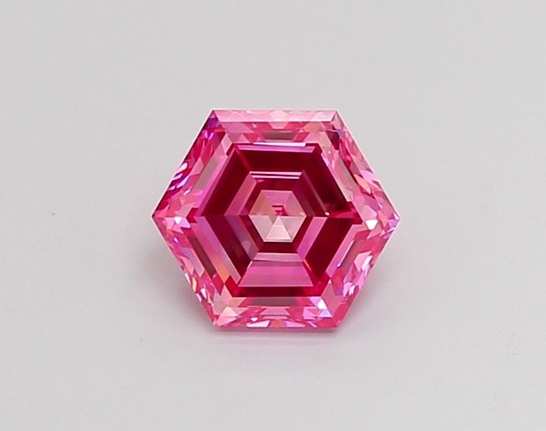 Loose Diamond - HEXAGONAL 1.0ct Fancy Vivid Pink VVS2: Loose Diamond - HEXAGONAL 1.0ct Fancy Vivid Pink VVS2 Source: This is a real non-mined Diamond that has been grown in a lab Shape: HEXAGONAL Carats: 1.0 Color: Fancy Vivid Pink Certification: IGI Vide