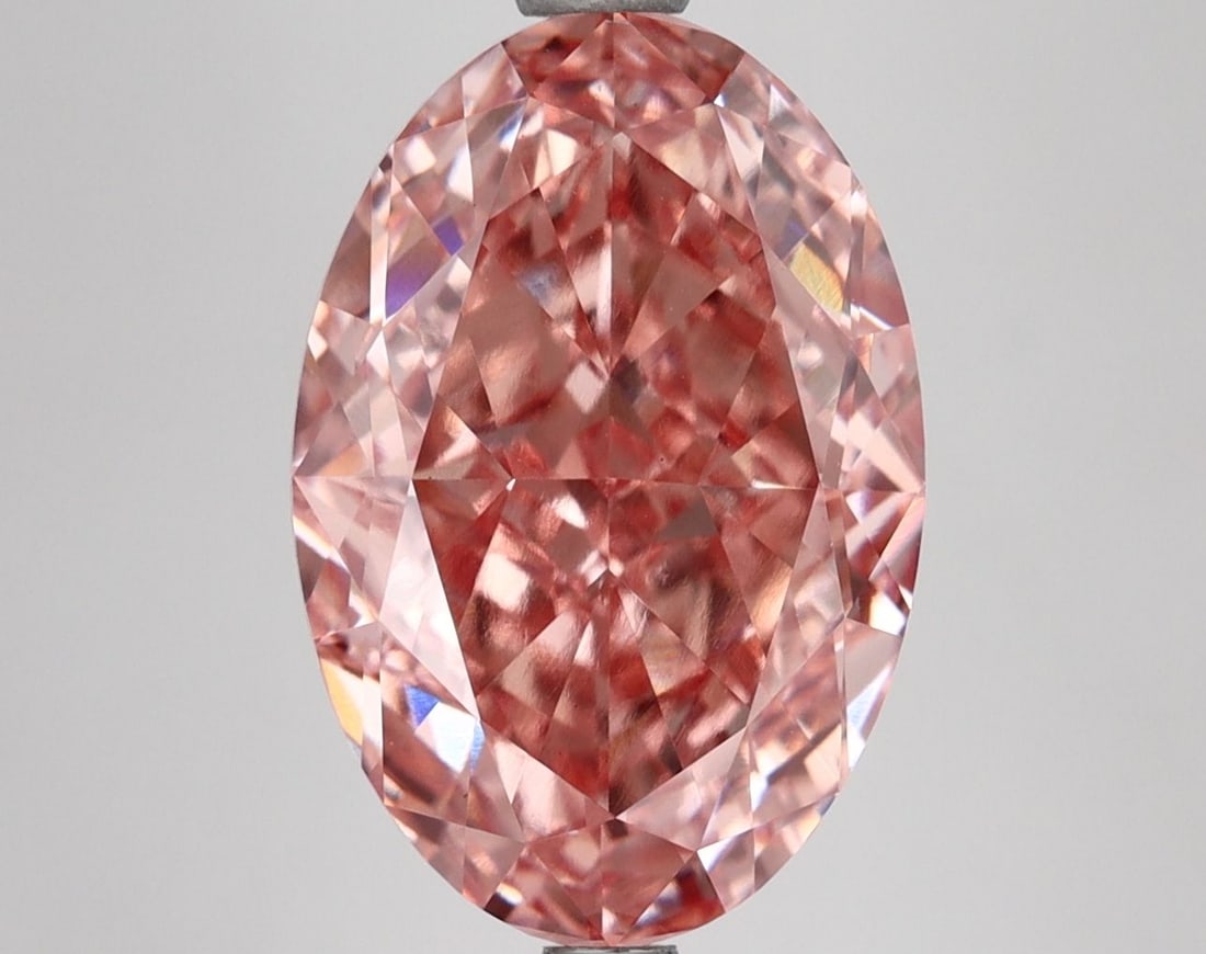 Loose Diamond - OVAL 6.08ct Fancy Vivid Pink VS1: Loose Diamond - OVAL 6.08ct Fancy Vivid Pink VS1 Source: This is a real non-mined Diamond that has been grown in a lab Shape: OVAL Carats: 6.08 Color: Fancy Vivid Pink Certification: IGI Video: