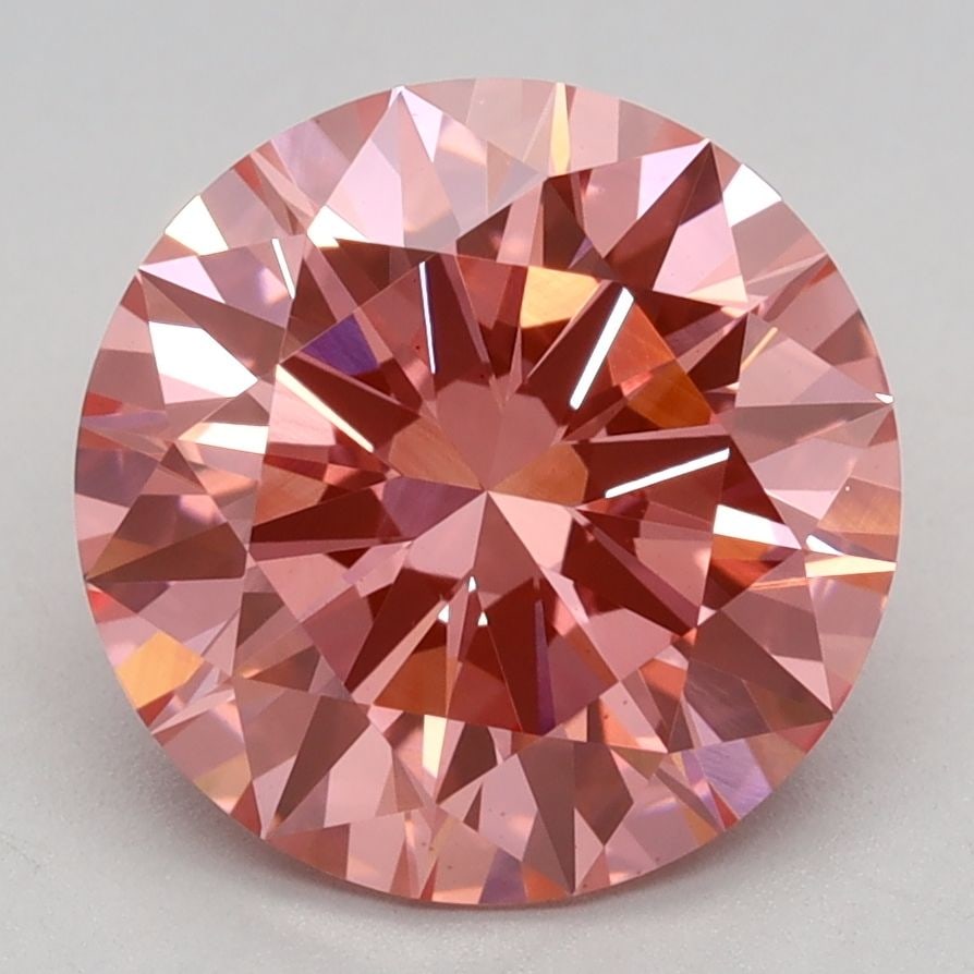 Ideal Loose Diamond - ROUND 2.59ct Fancy Vivid Pink VS1: Ideal Loose Diamond - ROUND 2.59ct Fancy Vivid Pink VS1 Source: This is a real non-mined Diamond that has been grown in a lab Shape: ROUND Carats: 2.59 Color: Fancy Vivid Pink Certification: IGI Video
