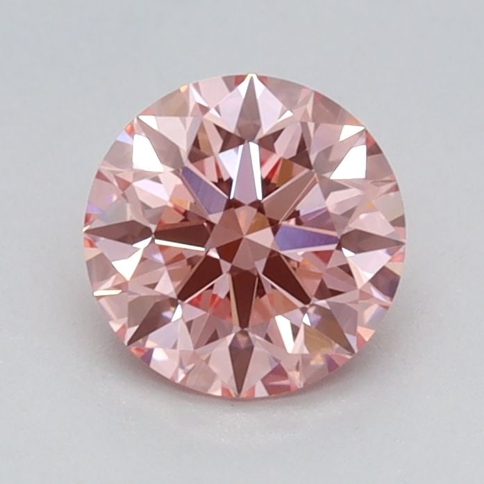Ideal Loose Diamond - ROUND 0.66ct Fancy Vivid Pink VVS2: Ideal Loose Diamond - ROUND 0.66ct Fancy Vivid Pink VVS2 Source: This is a real non-mined Diamond that has been grown in a lab Shape: ROUND Carats: 0.66 Color: Fancy Vivid Pink Certification: IGI Vide
