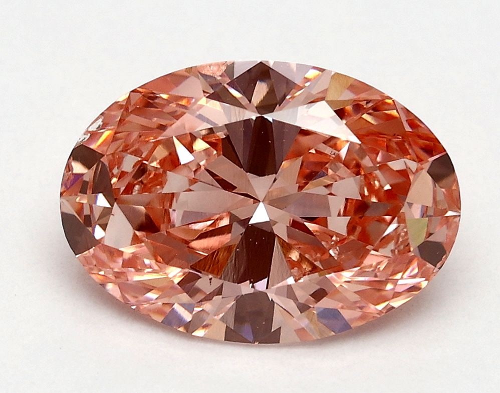 Loose Diamond - OVAL 1.8ct Fancy Vivid Pink VS2: Loose Diamond - OVAL 1.8ct Fancy Vivid Pink VS2 Source: This is a real non-mined Diamond that has been grown in a lab Shape: OVAL Carats: 1.8 Color: Fancy Vivid Pink Certification: IGI Video:
