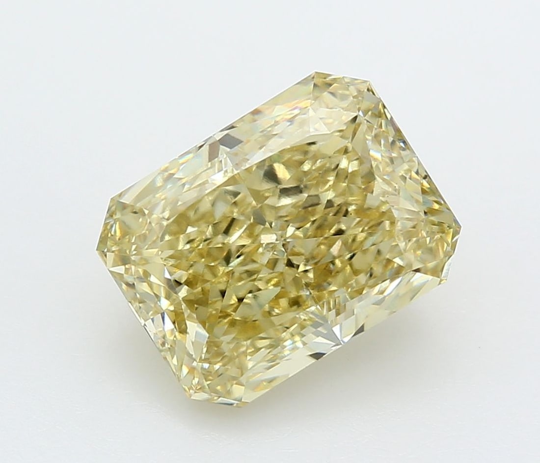 Loose Diamond - RADIANT 7.1ct Fancy Yellow VS1: Loose Diamond - RADIANT 7.1ct Fancy Yellow VS1 Source: This is a real non-mined Diamond that has been grown in a lab Shape: RADIANT Carats: 7.1 Color: Fancy Yellow Certification: IGI Video: