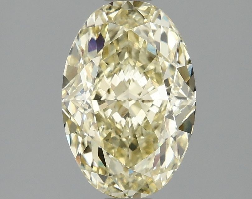 Loose Diamond - OVAL 2.1ct Fancy Intense Yellow VS1: Loose Diamond - OVAL 2.1ct Fancy Intense Yellow VS1 Source: This is a real non-mined Diamond that has been grown in a lab Shape: OVAL Carats: 2.1 Color: Fancy Intense Yellow Certification: IGI Video: