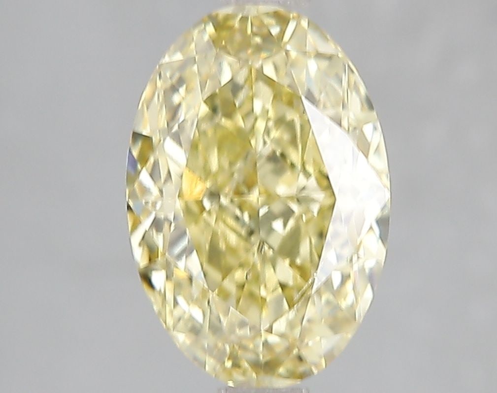 Loose Diamond - OVAL 3.02ct Fancy Vivid Yellow SI1: Loose Diamond - OVAL 3.02ct Fancy Vivid Yellow SI1 Source: This is a real non-mined Diamond that has been grown in a lab Shape: OVAL Carats: 3.02 Color: Fancy Vivid Yellow Certification: IGI Video: