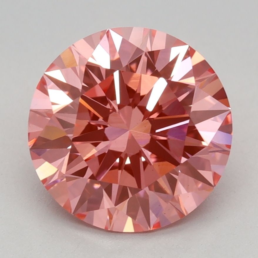 Ideal Loose Diamond - ROUND 2.08ct Fancy Vivid Pink VS1: Ideal Loose Diamond - ROUND 2.08ct Fancy Vivid Pink VS1 Source: This is a real non-mined Diamond that has been grown in a lab Shape: ROUND Carats: 2.08 Color: Fancy Vivid Pink Certification: IGI Video