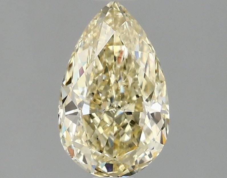 Loose Diamond - PEAR 1.5ct Fancy Yellow VS1: Loose Diamond - PEAR 1.5ct Fancy Yellow VS1 Source: This is a real non-mined Diamond that has been grown in a lab Shape: PEAR Carats: 1.5 Color: Fancy Yellow Certification: IGI Video: