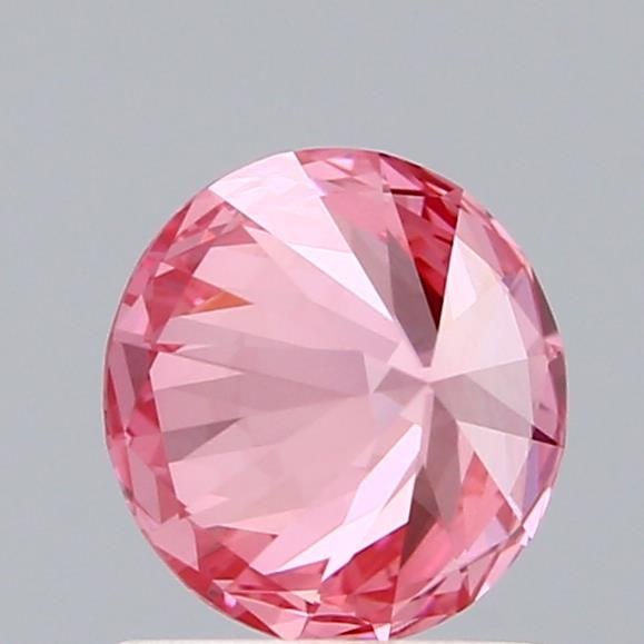 Loose Diamond - ROUND 1.18ct Fancy Vivid Pink VS1: Loose Diamond - ROUND 1.18ct Fancy Vivid Pink VS1 Source: This is a real non-mined Diamond that has been grown in a lab Shape: ROUND Carats: 1.18 Color: Fancy Vivid Pink Certification: IGI Video:
