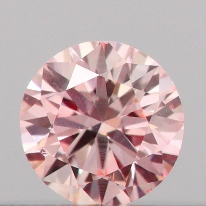 Loose Diamond - ROUND 0.11ct Fancy Pink VS2: Loose Diamond - ROUND 0.11ct Fancy Pink VS2 Source: This is a real non-mined Diamond that has been grown in a lab Shape: ROUND Carats: 0.11 Color: Fancy Pink Certification: IGI Video: