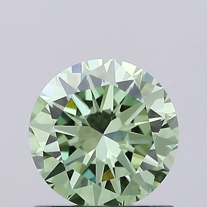 Loose Diamond - ROUND 0.83ct Fancy Vivid Green VS1: Loose Diamond - ROUND 0.83ct Fancy Vivid Green VS1 Source: This is a real non-mined Diamond that has been grown in a lab Shape: ROUND Carats: 0.83 Color: Fancy Vivid Green Certification: IGI Video: