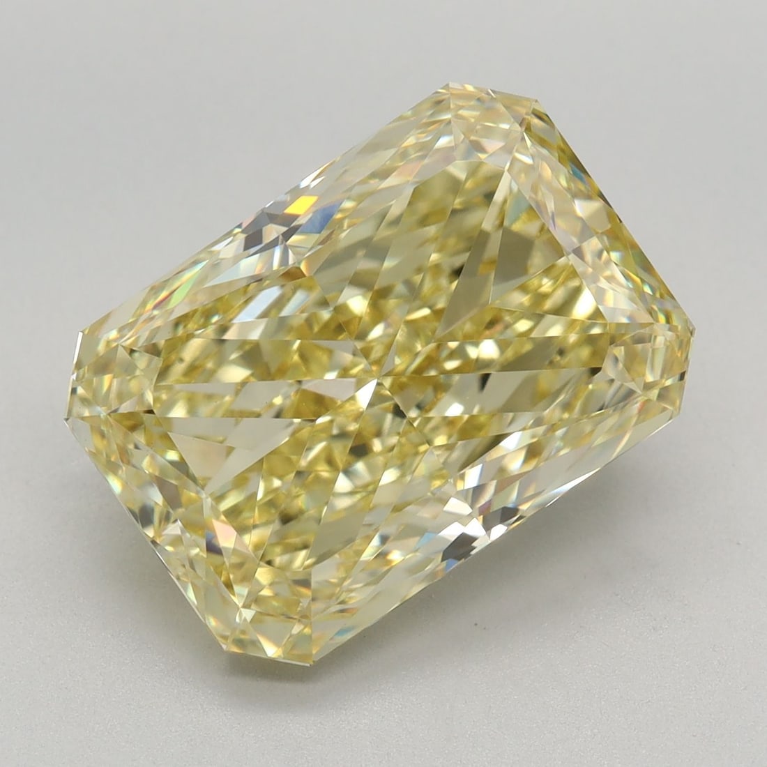 Loose Diamond - RADIANT 6.04ct Fancy Intense Yellow VVS2: Loose Diamond - RADIANT 6.04ct Fancy Intense Yellow VVS2 Source: This is a real non-mined Diamond that has been grown in a lab Shape: RADIANT Carats: 6.04 Color: Fancy Intense Yellow Certification: IG