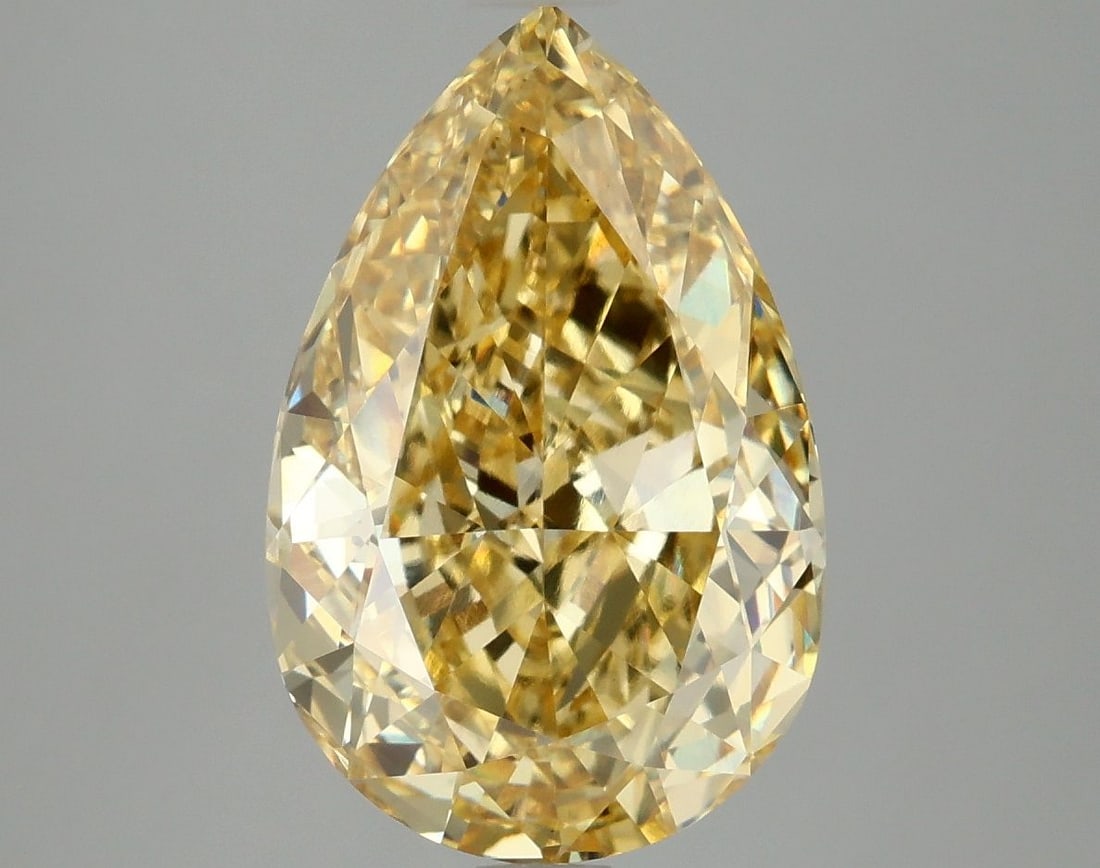 Loose Diamond - PEAR 5.1ct Fancy Vivid Yellow VS1: Loose Diamond - PEAR 5.1ct Fancy Vivid Yellow VS1 Source: This is a real non-mined Diamond that has been grown in a lab Shape: PEAR Carats: 5.1 Color: Fancy Vivid Yellow Certification: IGI Video: