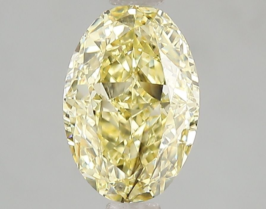 Loose Diamond - OVAL 2.02ct Fancy Intense Yellow SI1: Loose Diamond - OVAL 2.02ct Fancy Intense Yellow SI1 Source: This is a real non-mined Diamond that has been grown in a lab Shape: OVAL Carats: 2.02 Color: Fancy Intense Yellow Certification: IGI Video