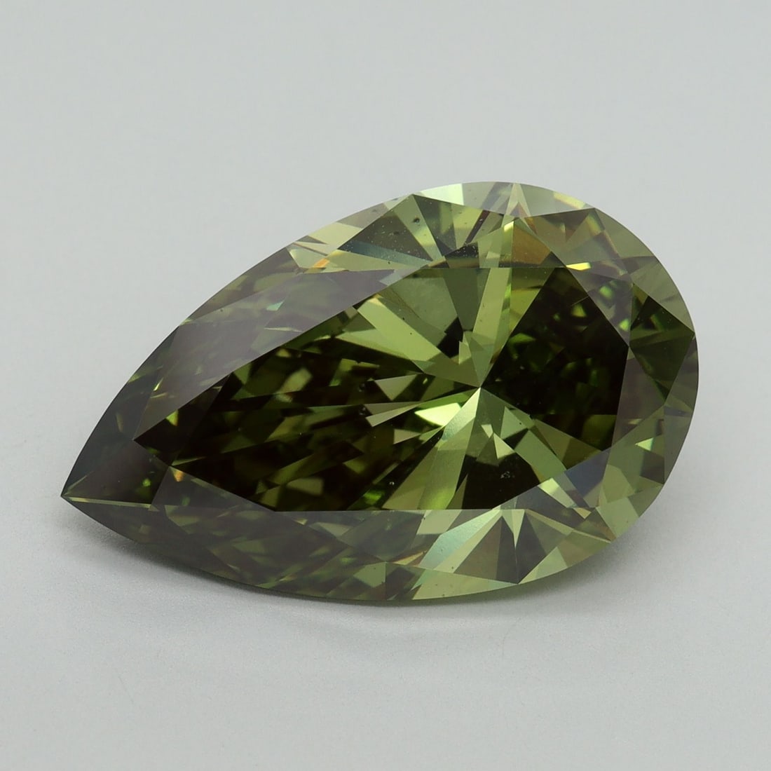 Loose Diamond - PEAR 8.99ct Fancy Vivid Green VS2: Loose Diamond - PEAR 8.99ct Fancy Vivid Green VS2 Source: This is a real non-mined Diamond that has been grown in a lab Shape: PEAR Carats: 8.99 Color: Fancy Vivid Green Certification: IGI Video: