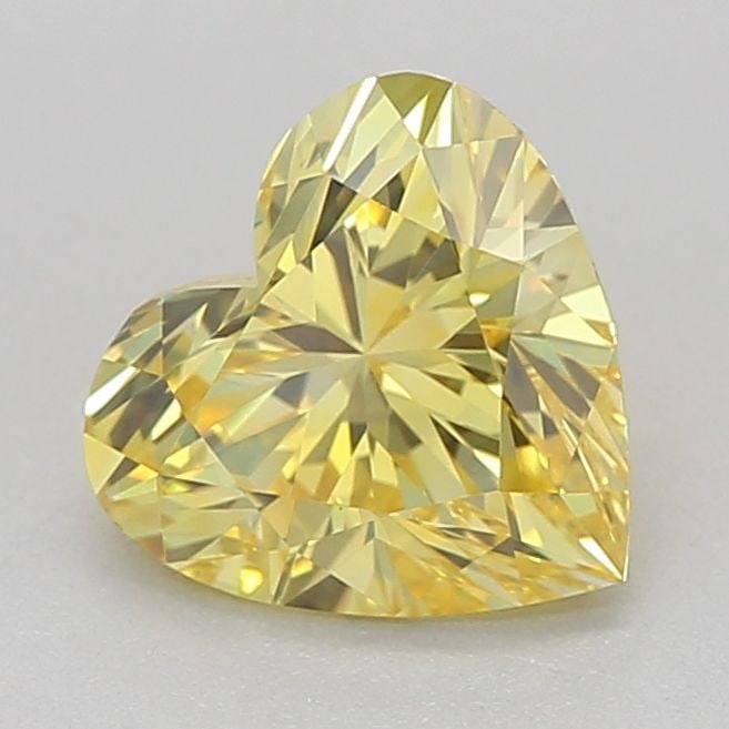 Loose Diamond - HEART 0.72ct Fancy Vivid Yellow VVS1: Loose Diamond - HEART 0.72ct Fancy Vivid Yellow VVS1 Source: This is a real non-mined Diamond that has been grown in a lab Shape: HEART Carats: 0.72 Color: Fancy Vivid Yellow Certification: IGI Video:
