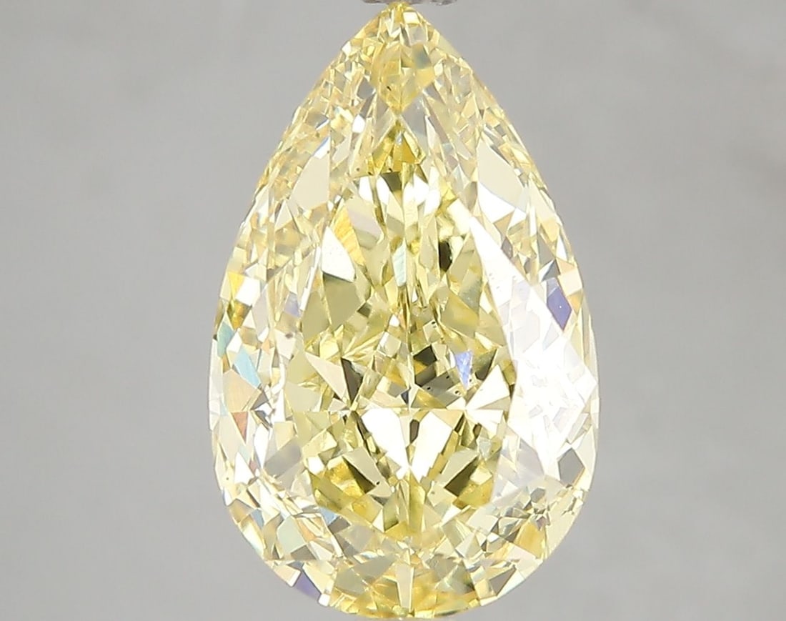 Loose Diamond - PEAR 5.02ct Fancy Vivid Yellow VS2: Loose Diamond - PEAR 5.02ct Fancy Vivid Yellow VS2 Source: This is a real non-mined Diamond that has been grown in a lab Shape: PEAR Carats: 5.02 Color: Fancy Vivid Yellow Certification: IGI Video:
