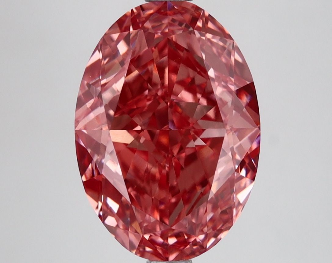 Loose Diamond - OVAL 4.28ct Fancy Vivid Pink VVS2: Loose Diamond - OVAL 4.28ct Fancy Vivid Pink VVS2 Source: This is a real non-mined Diamond that has been grown in a lab Shape: OVAL Carats: 4.28 Color: Fancy Vivid Pink Certification: IGI Video: