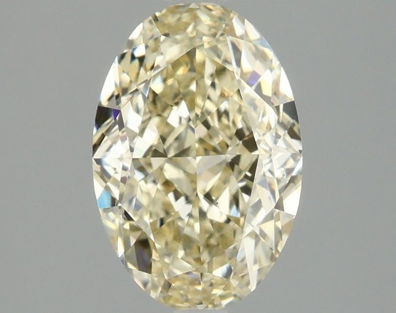 Loose Diamond - OVAL 2.05ct Fancy Yellow VS1: Loose Diamond - OVAL 2.05ct Fancy Yellow VS1 Source: This is a real non-mined Diamond that has been grown in a lab Shape: OVAL Carats: 2.05 Color: Fancy Yellow Certification: IGI Video: