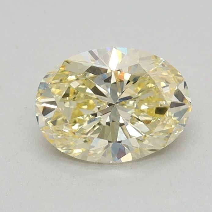Loose Diamond - OVAL 0.53ct Fancy Yellow VVS2: Loose Diamond - OVAL 0.53ct Fancy Yellow VVS2 Source: This is a real non-mined Diamond that has been grown in a lab Shape: OVAL Carats: 0.53 Color: Fancy Yellow Certification: IGI Video: