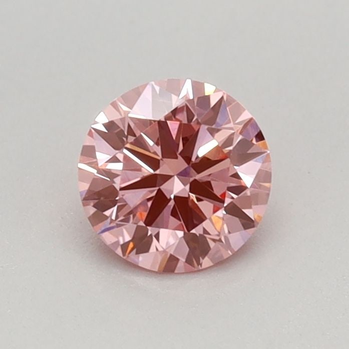Ideal Loose Diamond - ROUND 0.37ct Fancy Vivid Pink VVS2: Ideal Loose Diamond - ROUND 0.37ct Fancy Vivid Pink VVS2 Source: This is a real non-mined Diamond that has been grown in a lab Shape: ROUND Carats: 0.37 Color: Fancy Vivid Pink Certification: IGI Vide