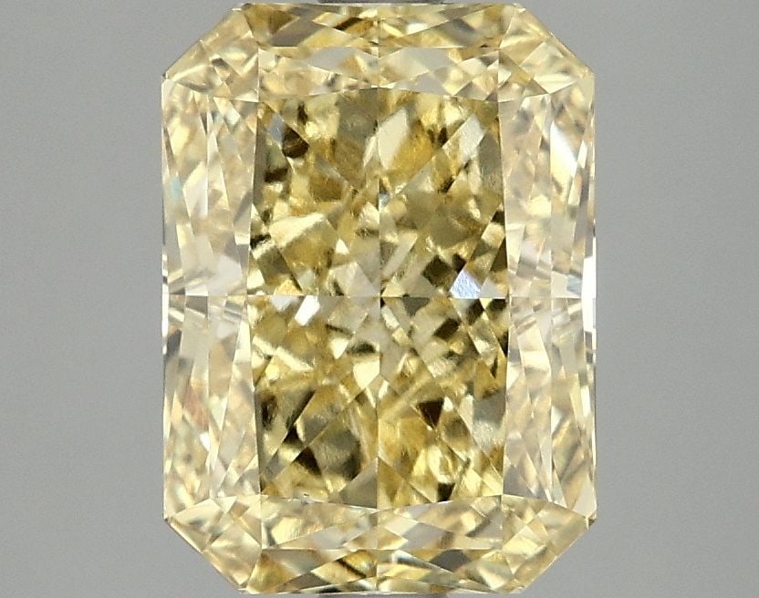 Loose Diamond - RADIANT 3.11ct Fancy Vivid Yellow VS1: Loose Diamond - RADIANT 3.11ct Fancy Vivid Yellow VS1 Source: This is a real non-mined Diamond that has been grown in a lab Shape: RADIANT Carats: 3.11 Color: Fancy Vivid Yellow Certification: IGI Vid