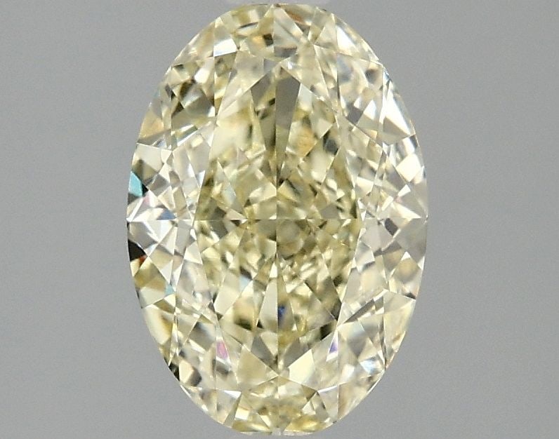 Loose Diamond - OVAL 2.01ct Fancy Yellow VVS2: Loose Diamond - OVAL 2.01ct Fancy Yellow VVS2 Source: This is a real non-mined Diamond that has been grown in a lab Shape: OVAL Carats: 2.01 Color: Fancy Yellow Certification: IGI Video: