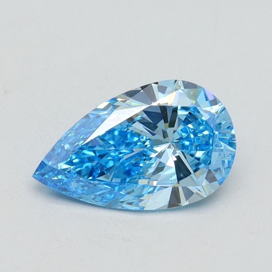 Loose Diamond - PEAR 1.0ct Fancy Vivid Blue VS2: Loose Diamond - PEAR 1.0ct Fancy Vivid Blue VS2 Source: This is a real non-mined Diamond that has been grown in a lab Shape: PEAR Carats: 1.0 Color: Fancy Vivid Blue Certification: IGI Video: Video